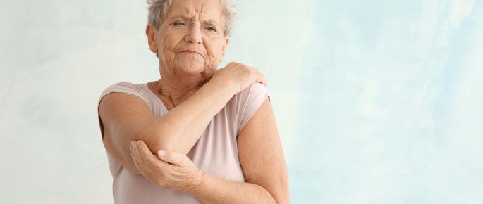 Senior woman with elbow pain